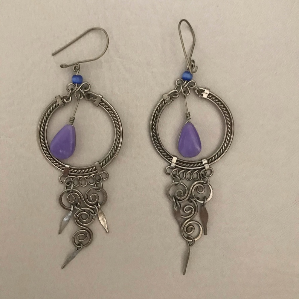 Decorative earrings with purple bead